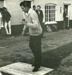 Dick Hewitt step dancing outside the pub