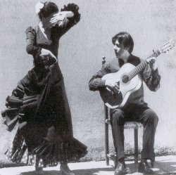 Tom�s de los Reyes in action with dancer, Mar�a G�mez.