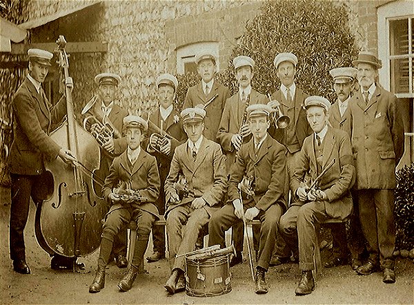 An old postcard of Blakeney village band, undated but seemingly taken before the First World War.